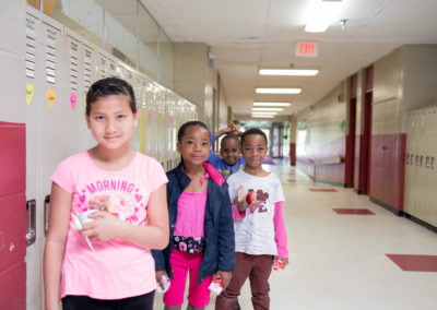 Students in School Hallways